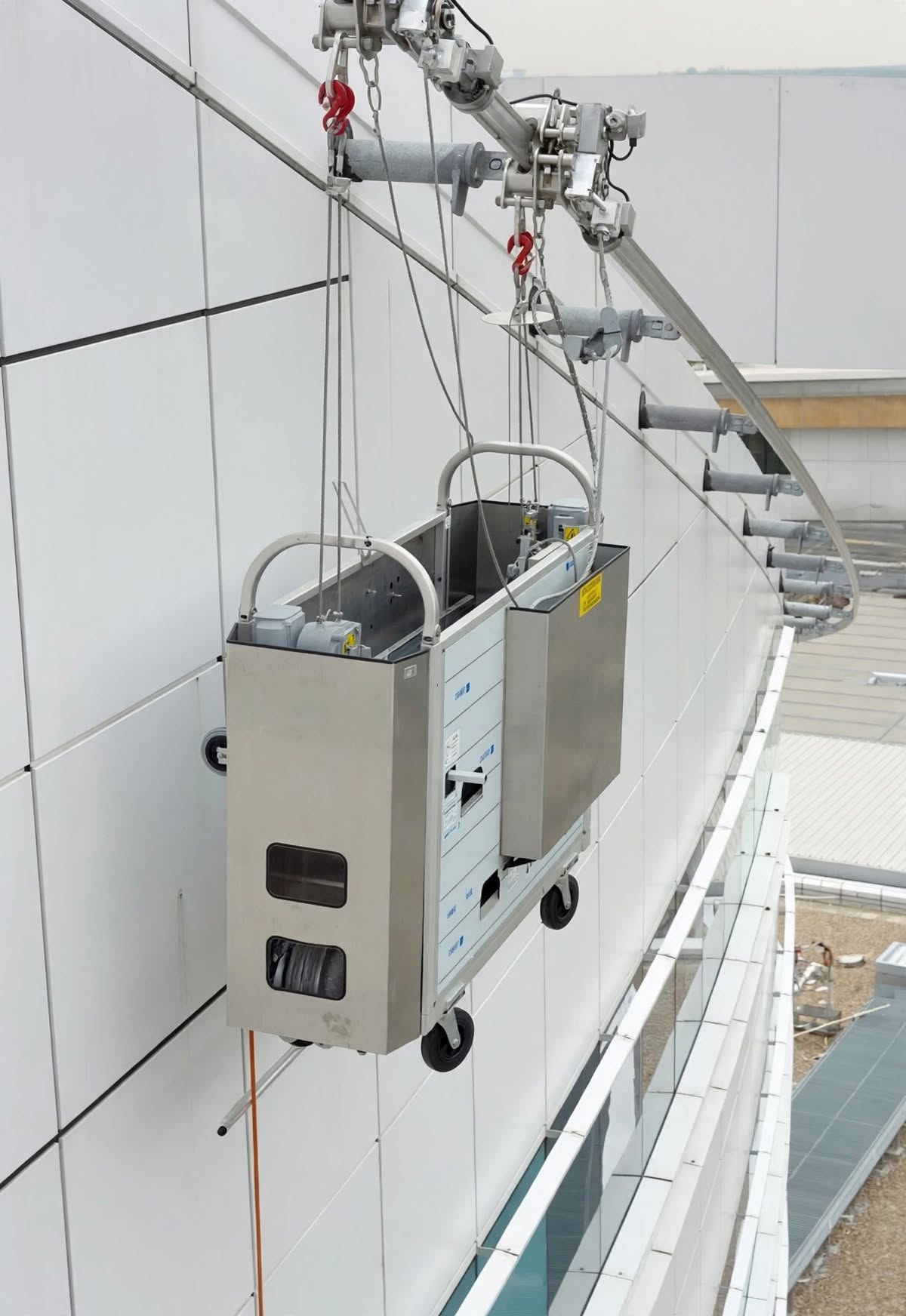 Roof-mounted crane on a building under construction